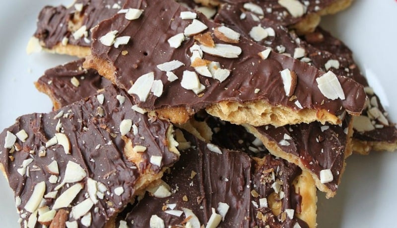 saltine cracker toffee with melted chocolate on top 