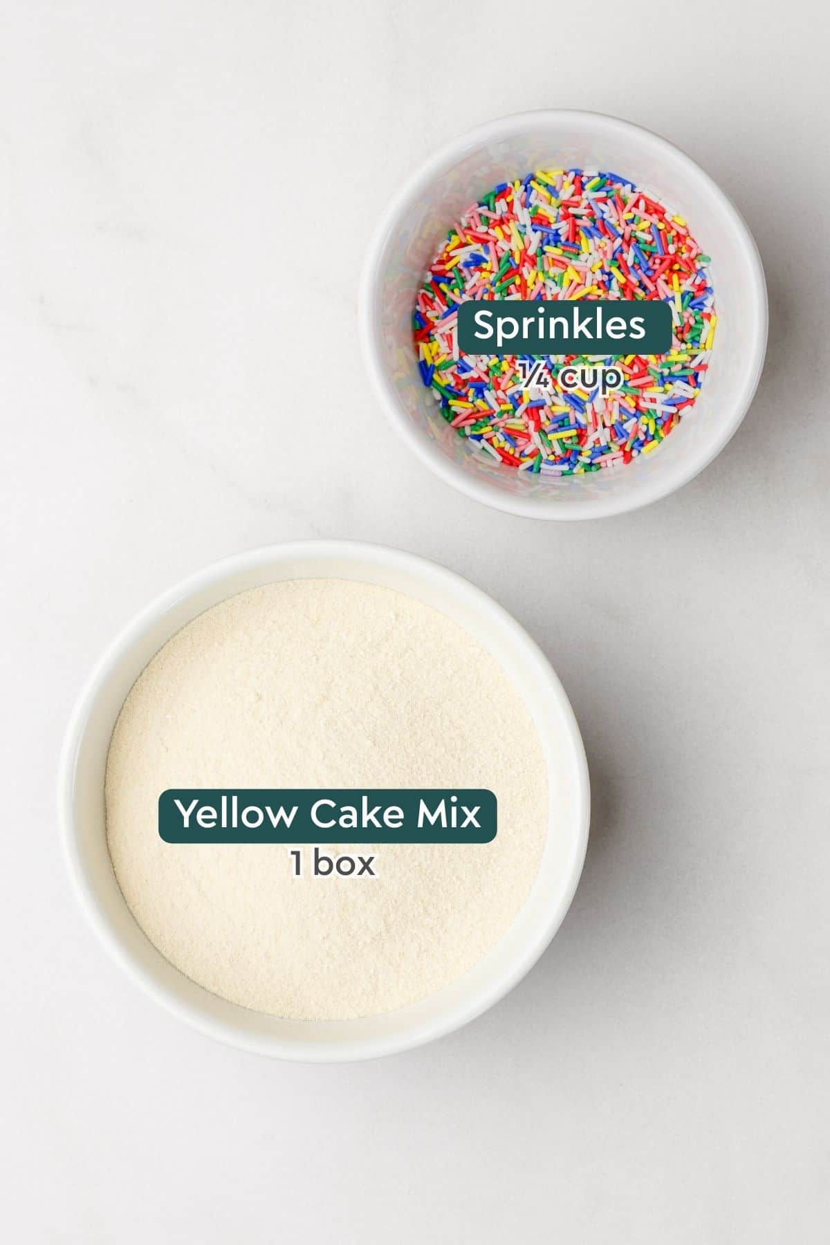 Ingredients for birthday cake pancake recipe, including sprinkles and yellow cake mix.