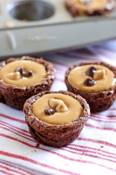 Peanut Butter Cup Brownies! Pull out your favorite boxed mix brownies and make this delicious, peanut buttery, chocolate treat in no time!