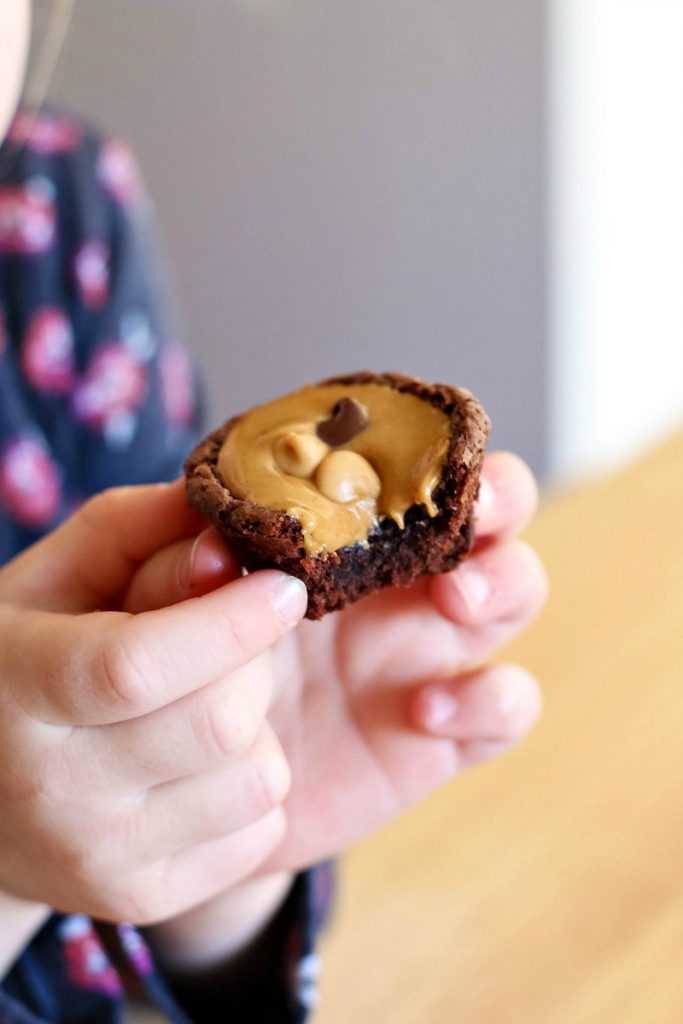 Peanut Butter Cup Brownies! Pull out your favorite boxed mix brownies and make this delicious, peanut buttery, chocolate treat in no time!