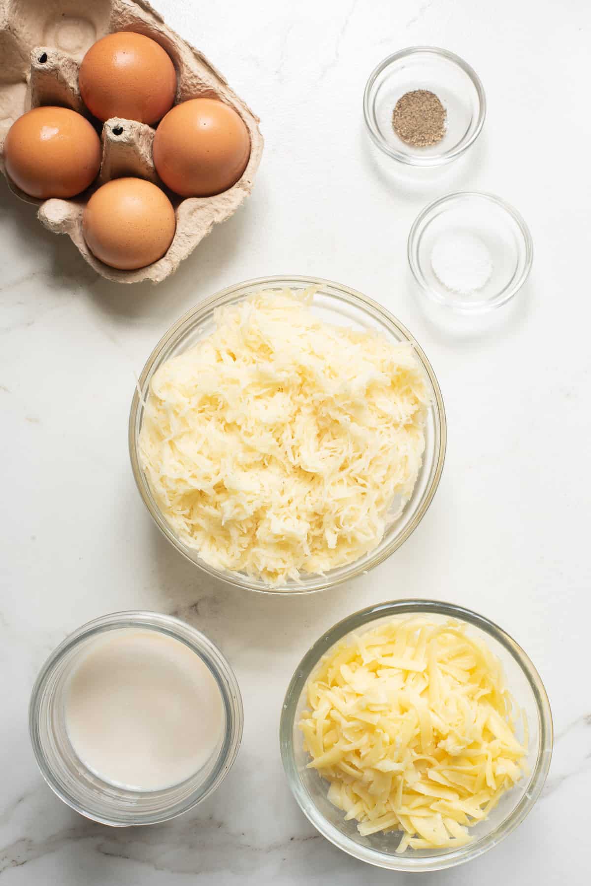 ingredients to make cheesy egg and potatoes casserole