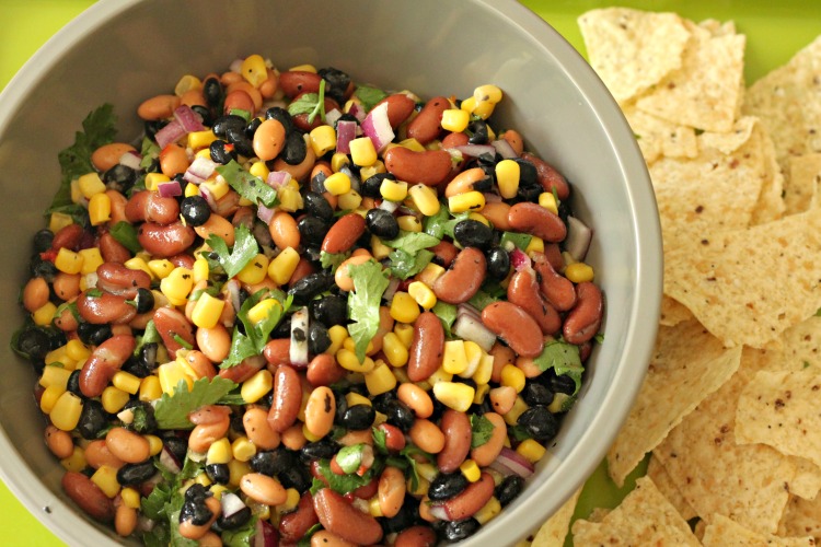 There's so many dishes I love to take to gatherings, but one that is super easy to make when you're in a time crunch or want to make on a budget is Texas Caviar!