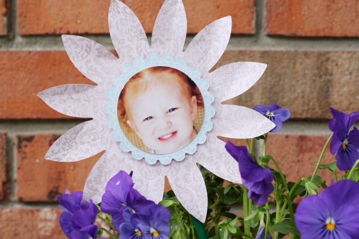 cute paper flower with child's picture in the middle 