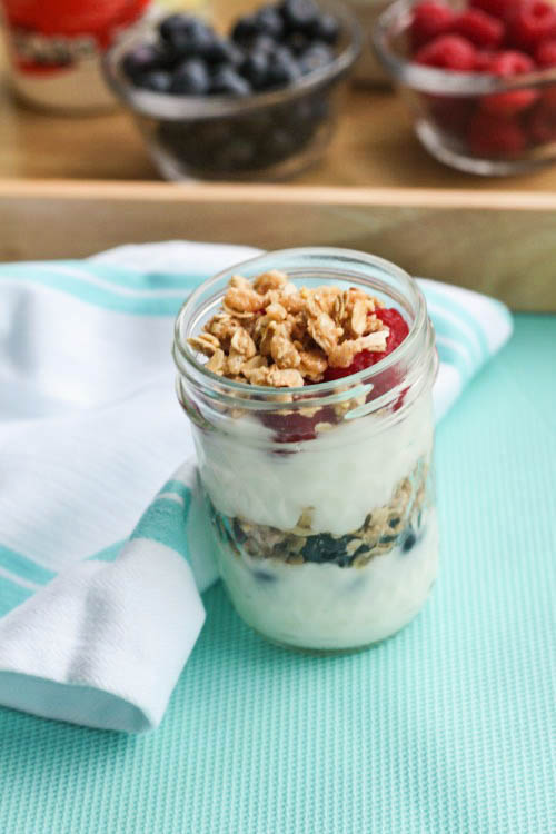 Choose to eat better this summer and make healthy snacks for your family like this Fresh Berry and Coconut Granola Yogurt Parfait! 
