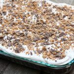 A doctored up cake mix and other store bought ingredients makes this Heath Bar Cake super easy to make and a complete hit every time!