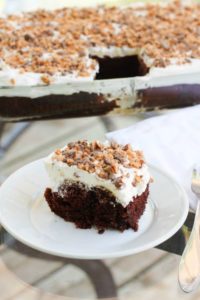 A doctored up cake mix and a few other store bought ingredients makes this Heath Bar Cake super easy to make and a complete hit every time!