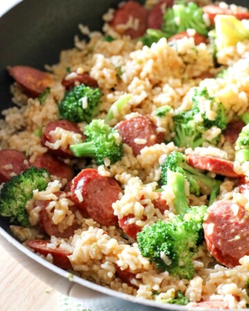 This quick & easy Smoked Sausage & Rice One Skillet Meal Recipe can be made in under 30 minutes and promises to be a hit around your dinner table!