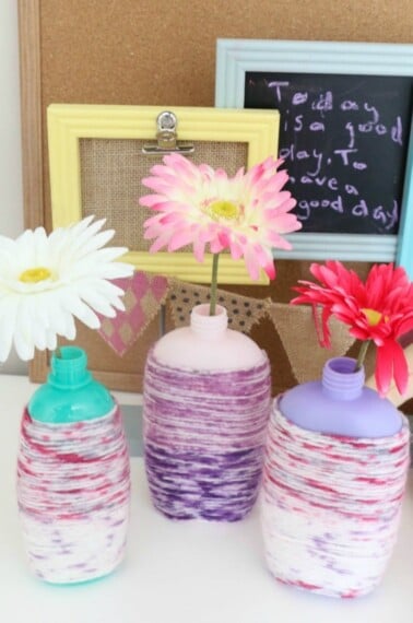 What better way to introduce recycling and "upcycling" to kids than to do some fun craft projects like this EASY DIY Recycled Bottle Flower Vase Craft?!