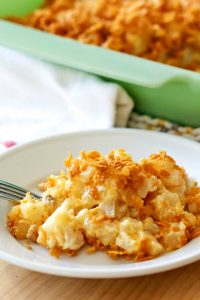 Made with simple ingredients, this Easy & Delicious Cheesy Potato Casserole Recipe is a must-have for any get-together you host!
