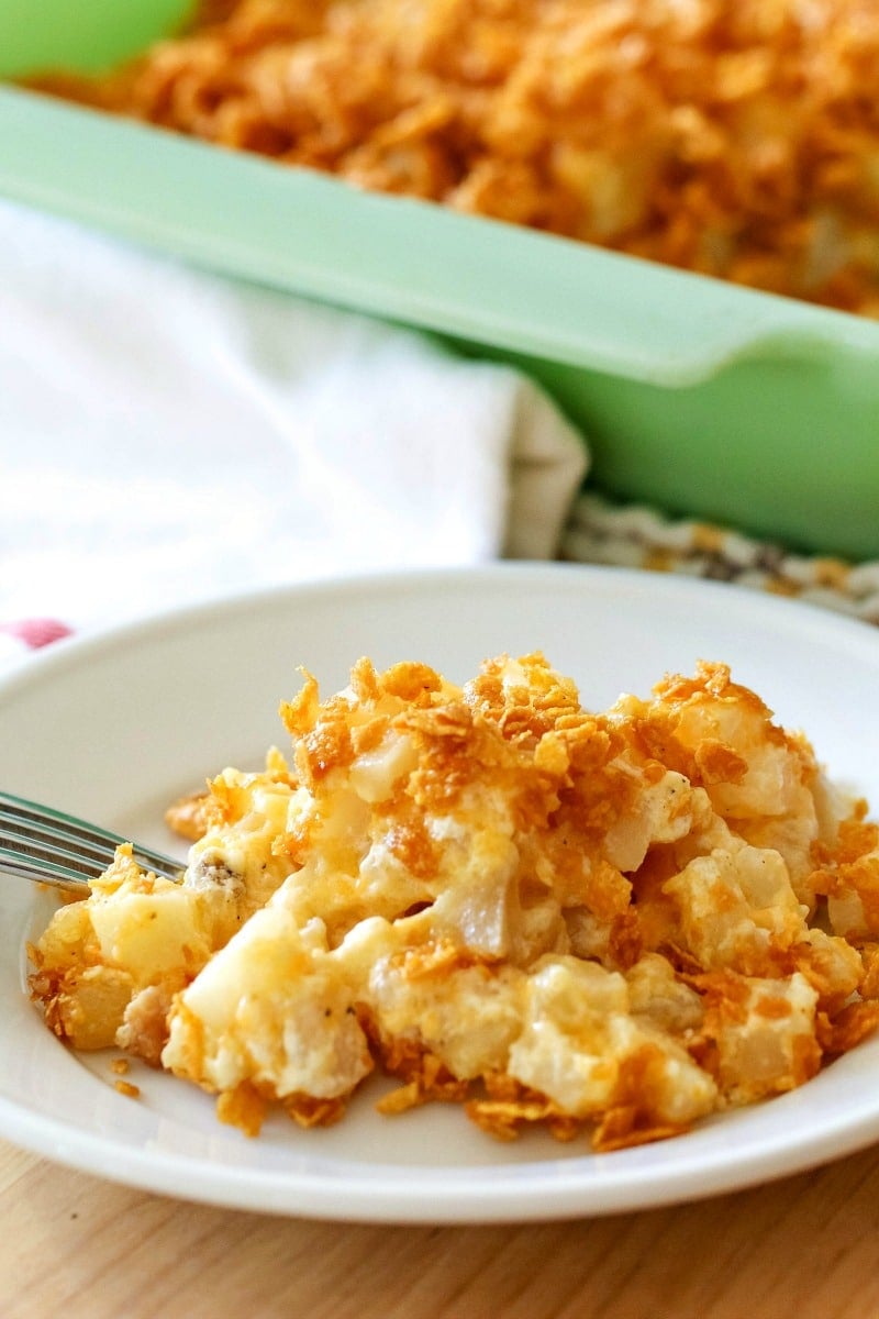 cheesy potatoes casserole on a plate 