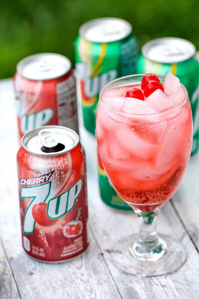 7UP spritzer in a class with a cherry