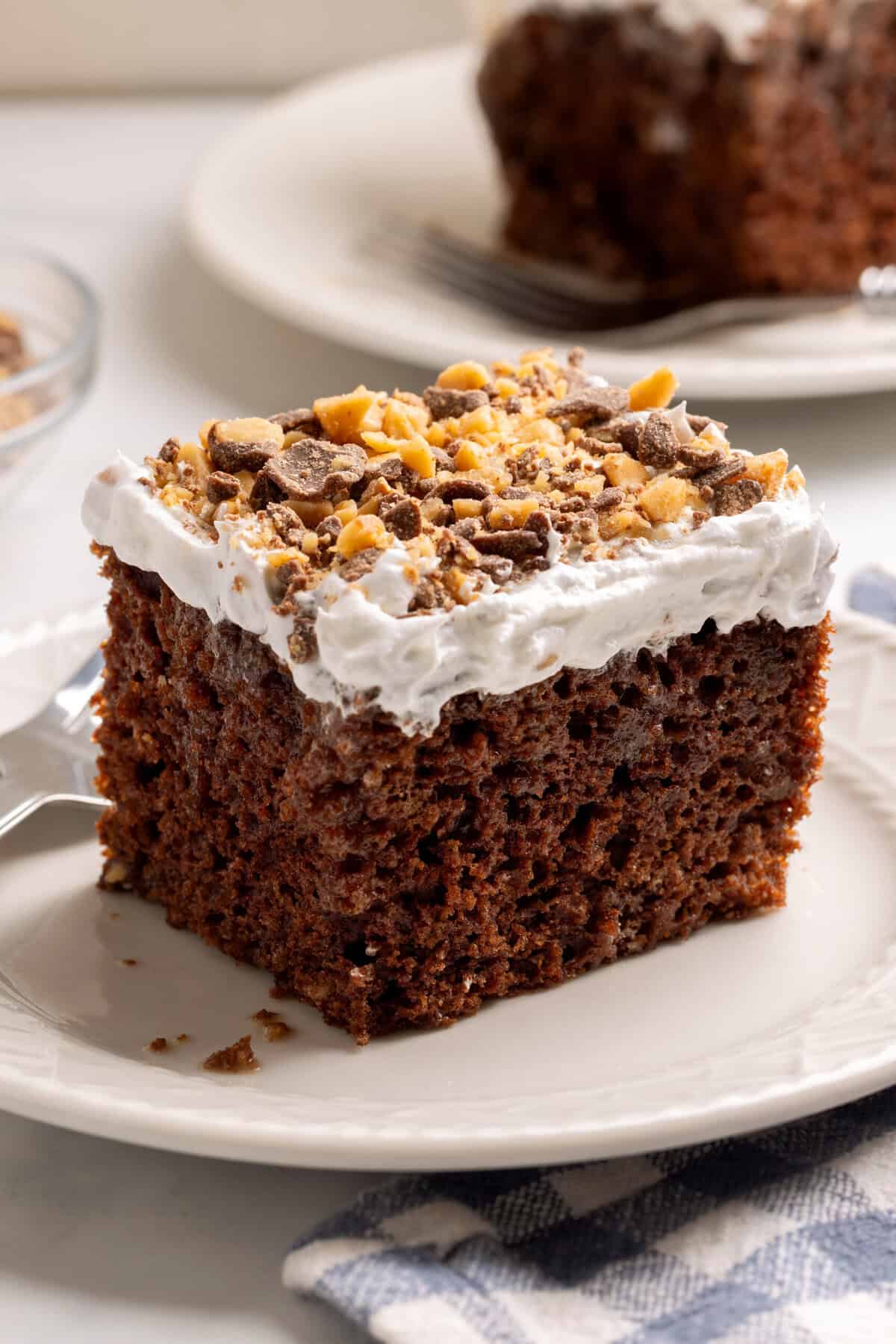 a piece of heath cake on a white plate. 