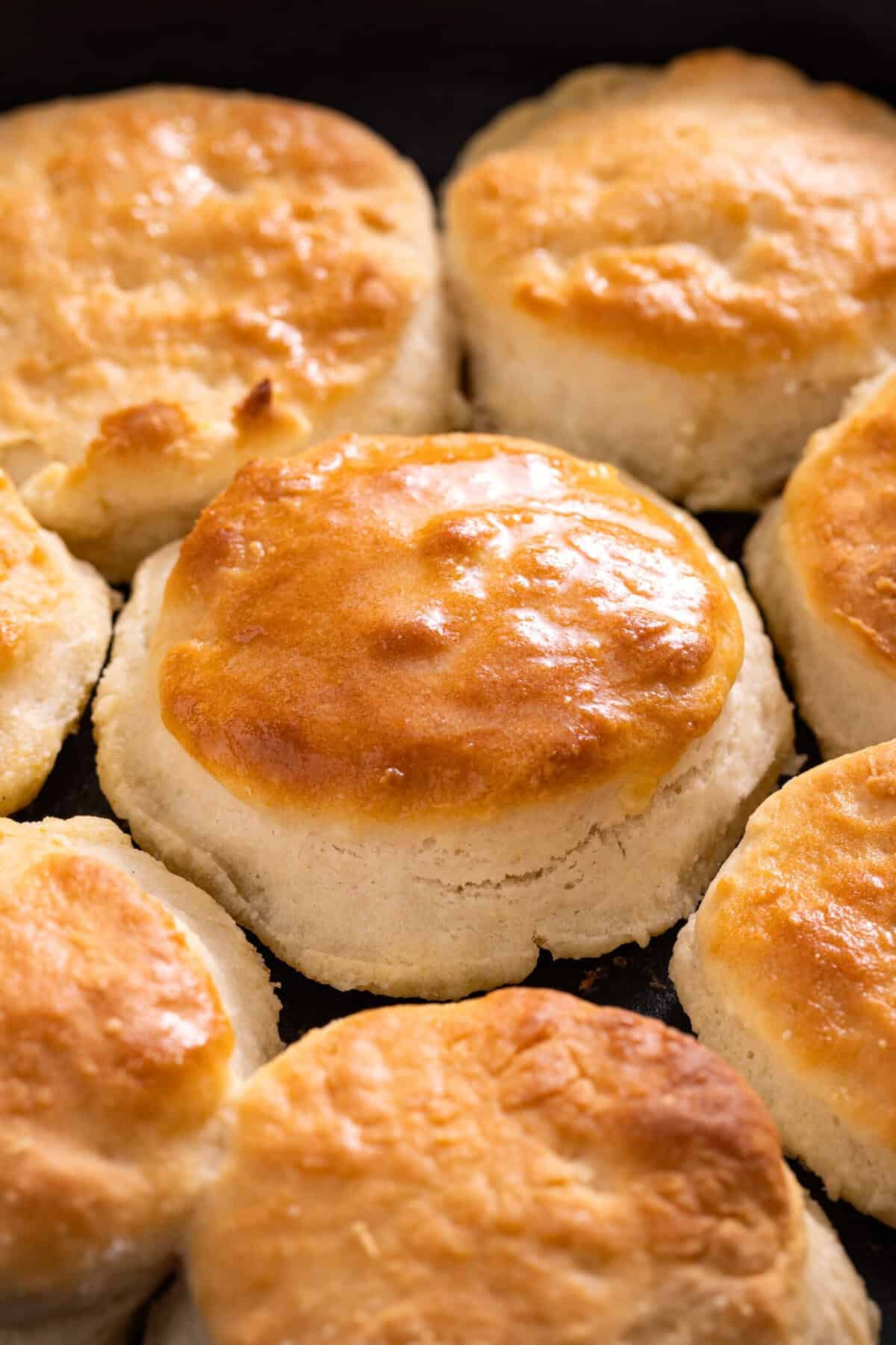 Golden brown Sprite biscuits in cast iron skillet.