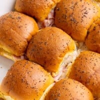 Ham and Swiss sliders in baking dish.