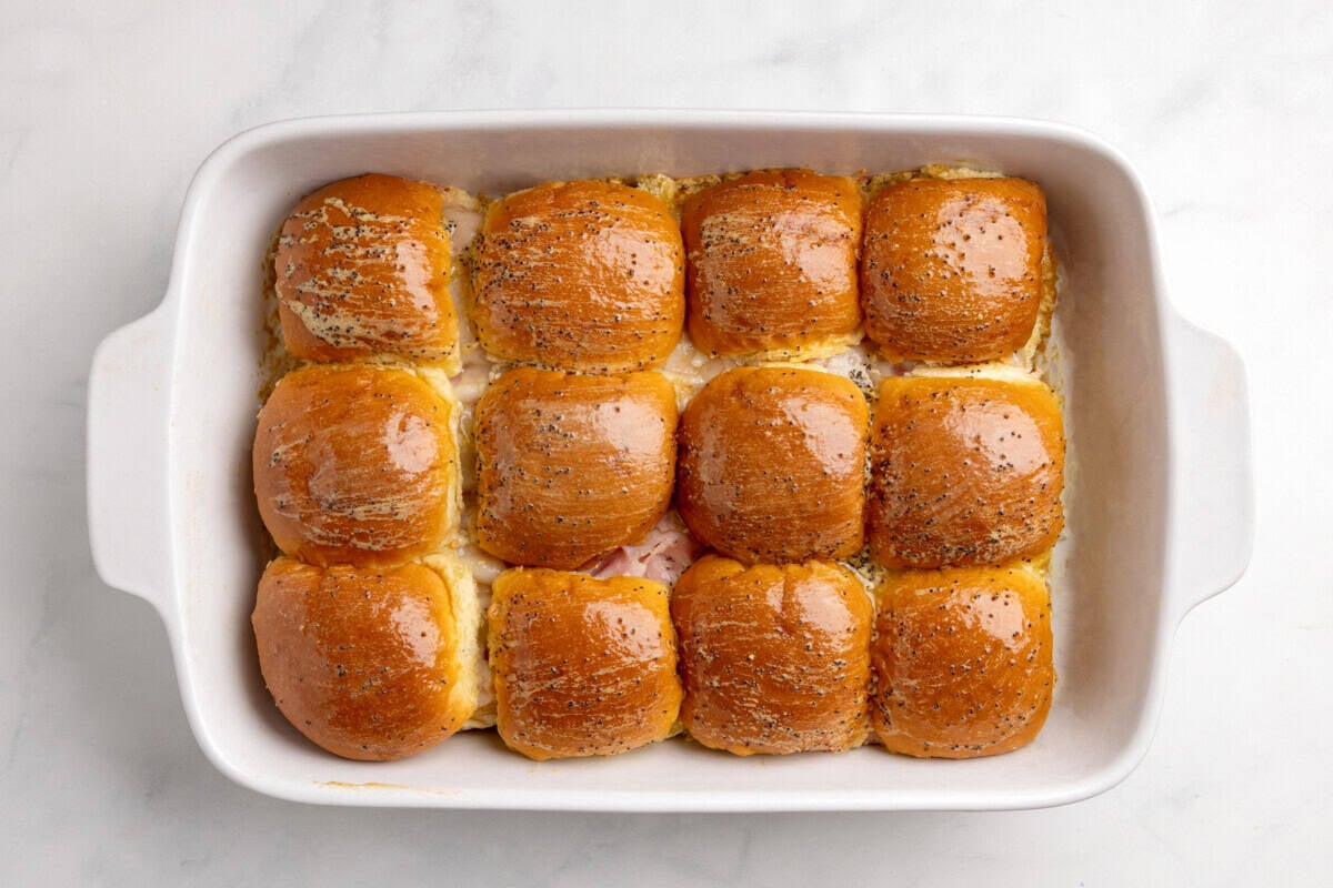 Ham and Swiss sliders in baking dish.