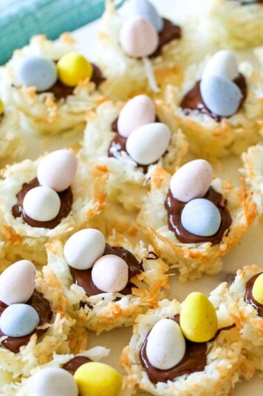 You're gonna love these Coconut Macaroon Nests that are filled with dark chocolate and topped with Mini Cadbury Eggs because they are the perfect Easter treat!  #macaroons #coconut #cookies #easter #dessert #allthingsmamma | allthingsmamma.com