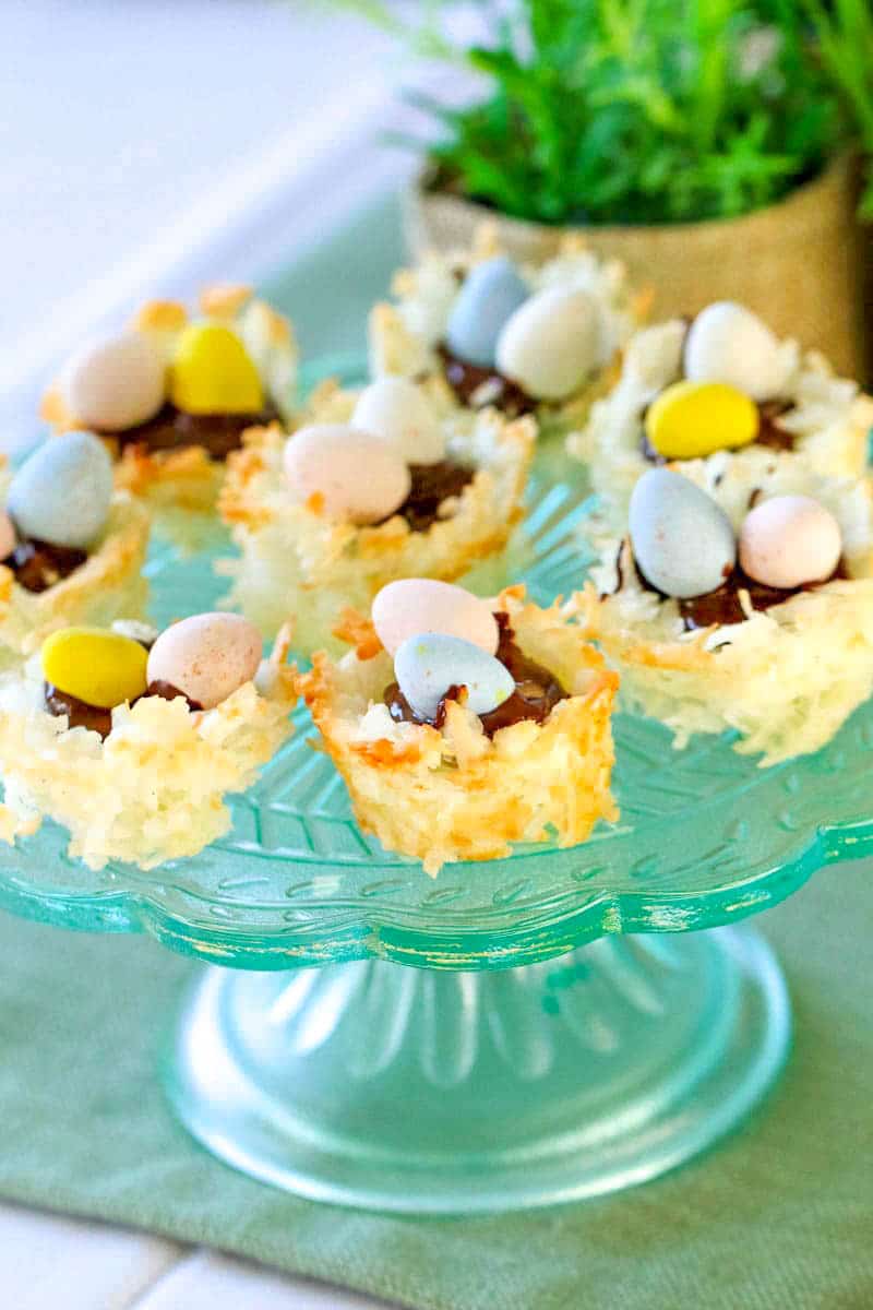 coconut macaroon nests on a cake stand 