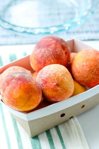box of fresh peaches