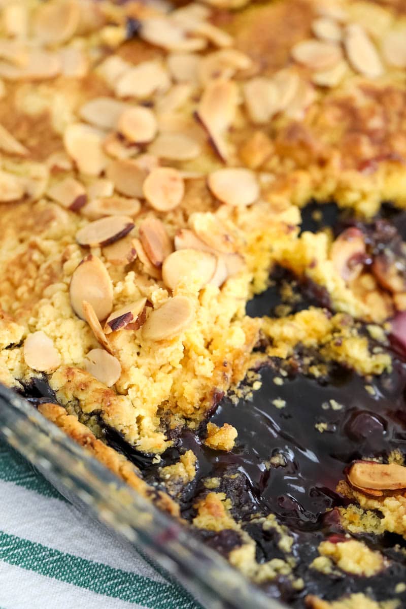 Close up of blueberry dump cake in baking dish
