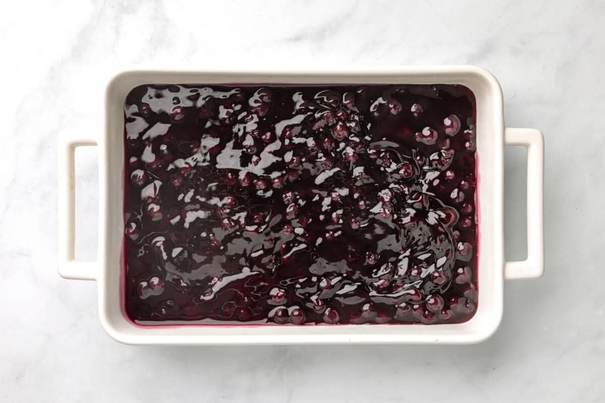 Blueberry pie filling in baking dish.