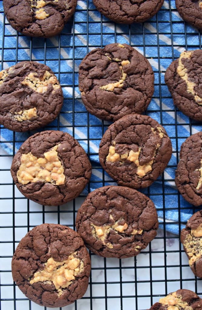 These Chocolate Cake Mix Cookies are so easy and fast to make, delicious, and a family favorite! We fold in creamy peanut butter to make these a chocolate cookie recipe that will be on repeat in your home! #cookies #dessert #chocolate #peanutbutter #cakemixcookies #allthingsmamma | allthingsmamma.com