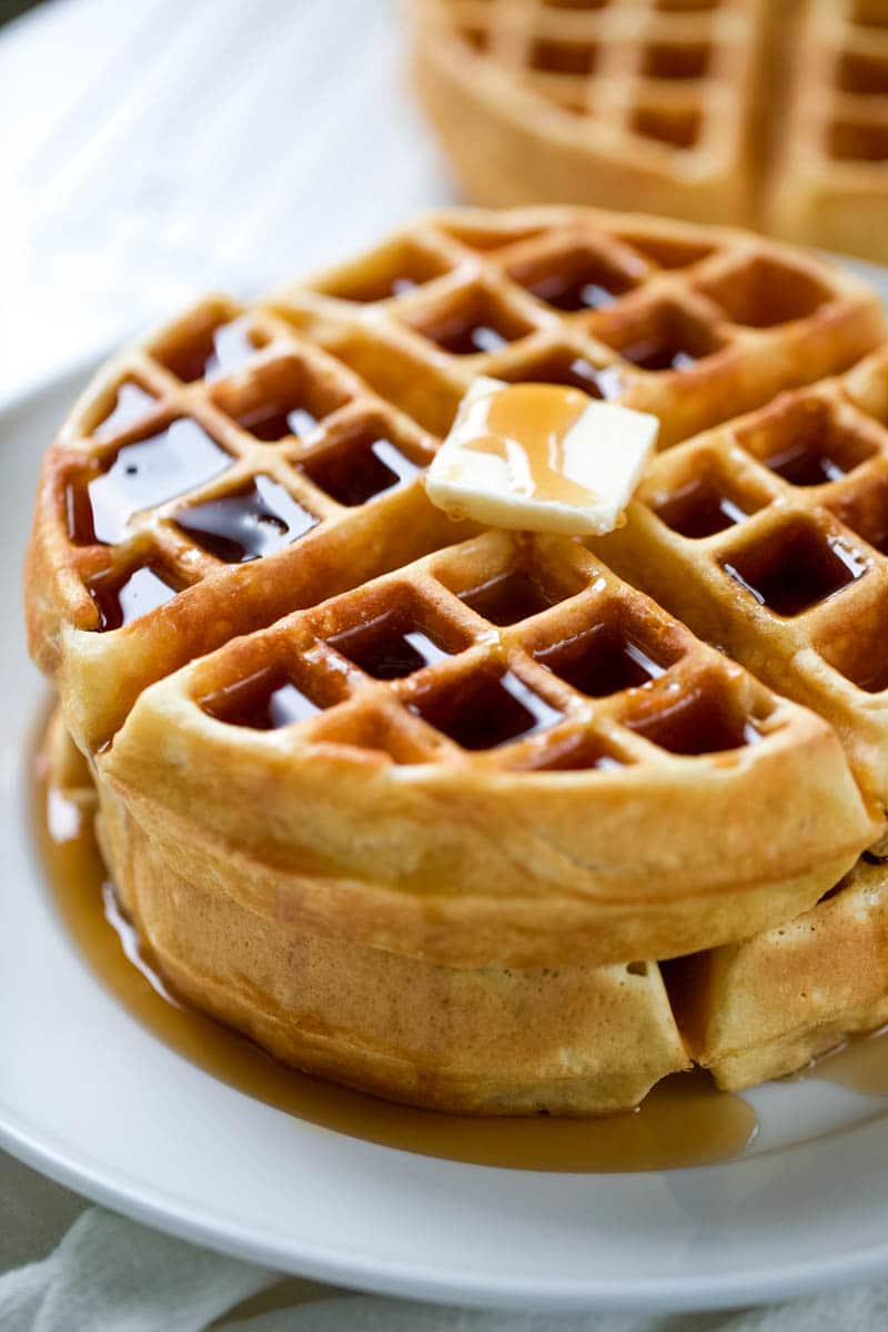 waffle recipe on a plate with butter and syrup 