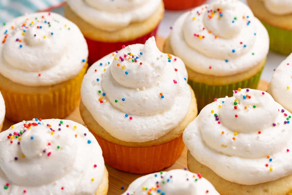 Cupcakes topped with American buttercream frosting.