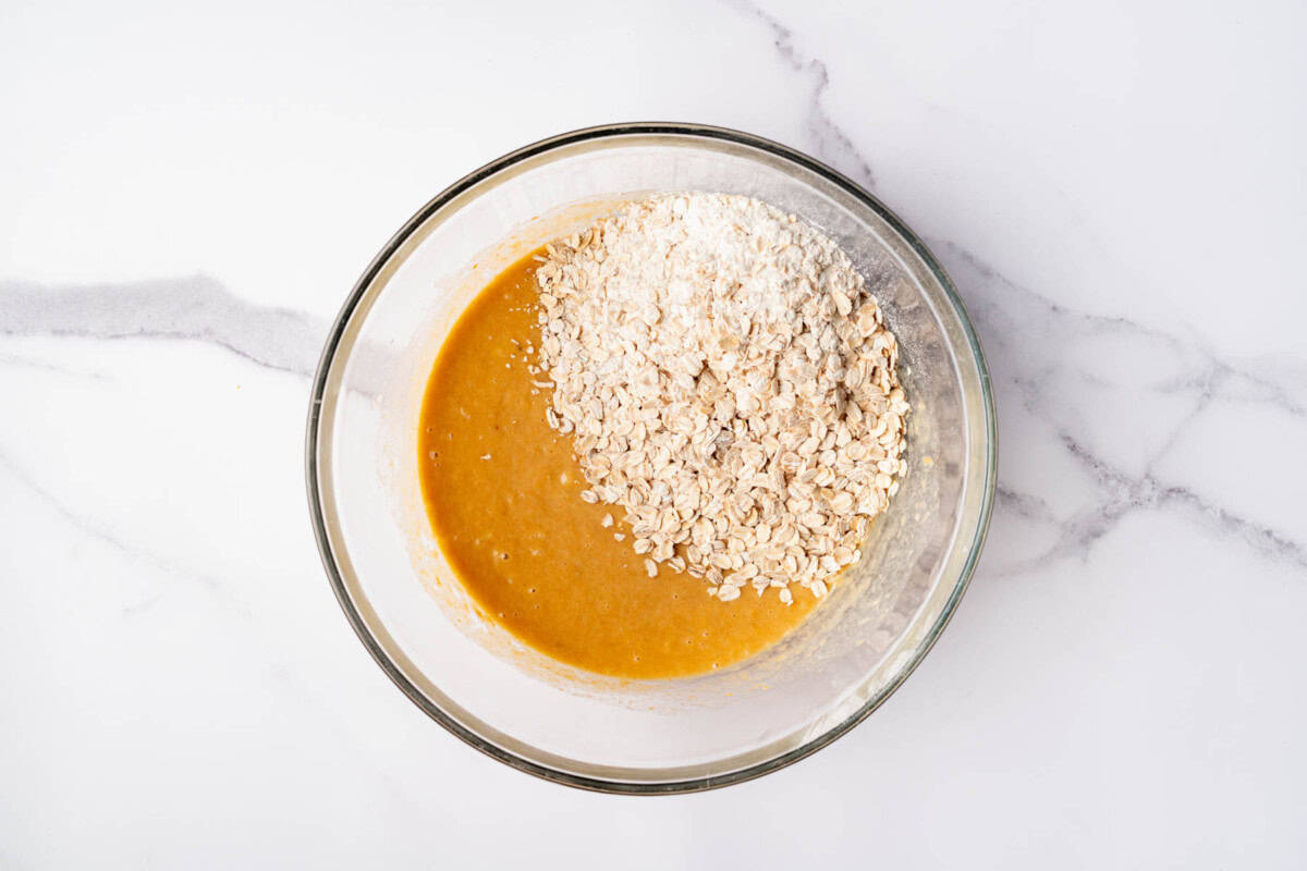 Dry ingredients added to bowl of wet ingredients.