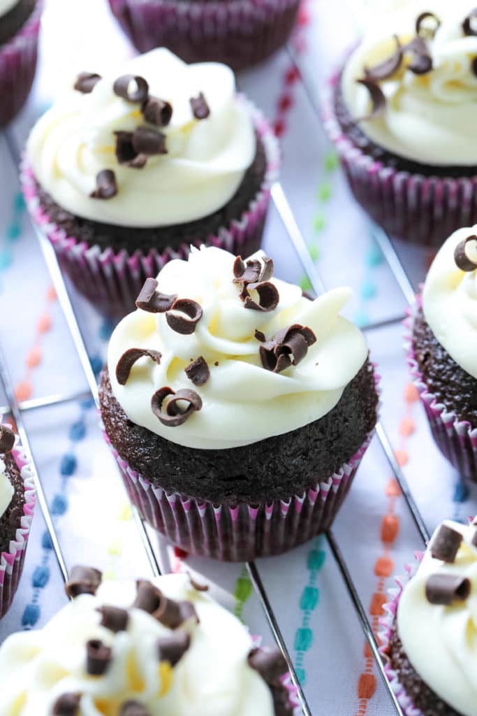 chocolate cupcakes topped with cream cheese frosting