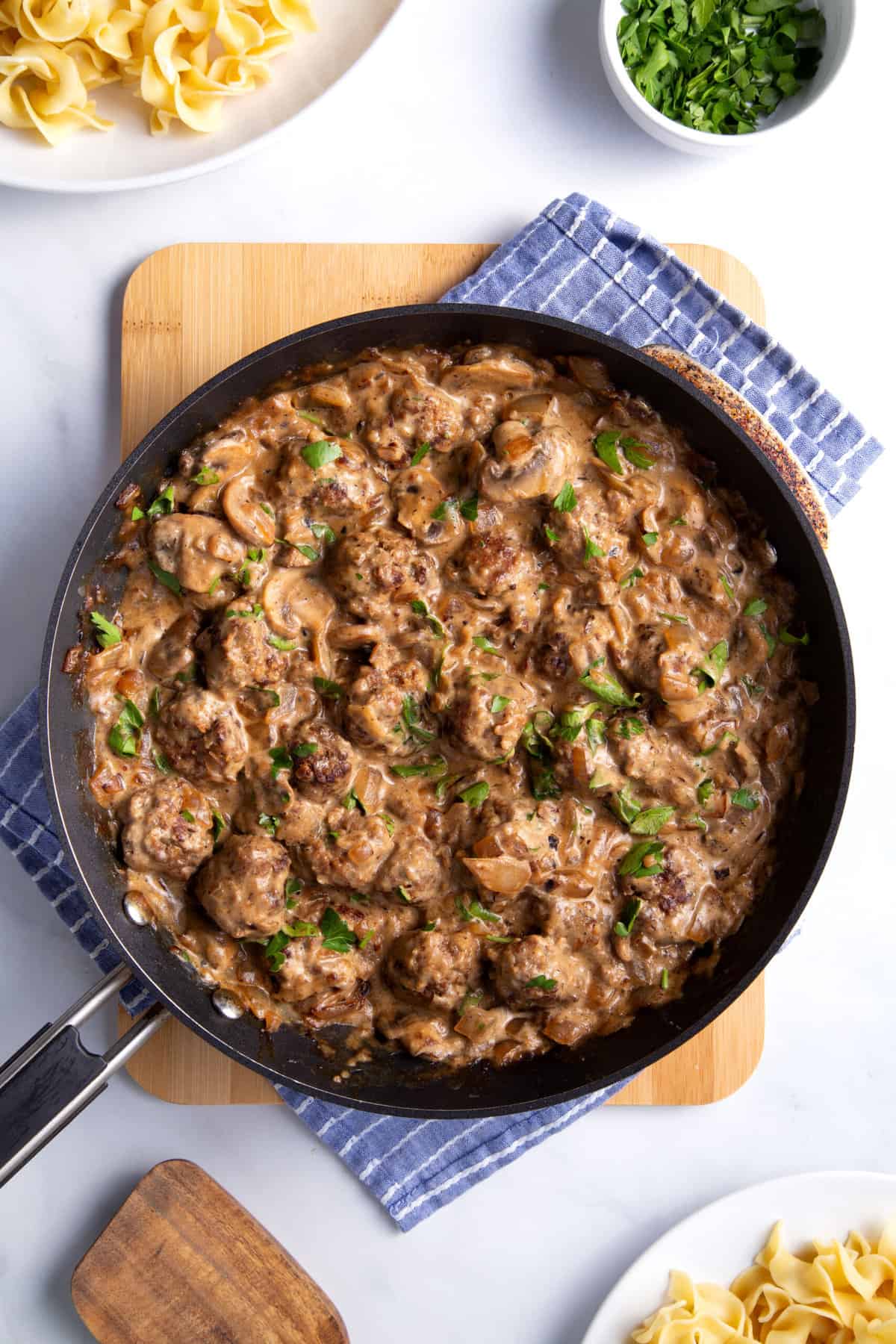 top down view of meatball stroganoff served in a large saute pan