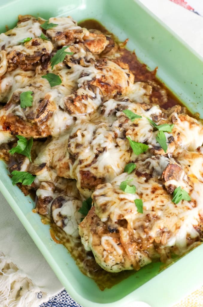 Baked cheesy chicken with mushrooms.