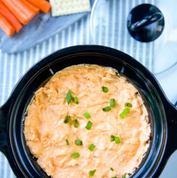 Healthy Buffalo Chicken Dip is a delicious, lighter, no-guilt version of your favorite game-day appetizer! All the flavor of Buffalo Chicken Dip but a skinny version! #buffalochicken #buffalochickendip #dip #appetizer #gamedayappetizer #crockpot #slowcooker
