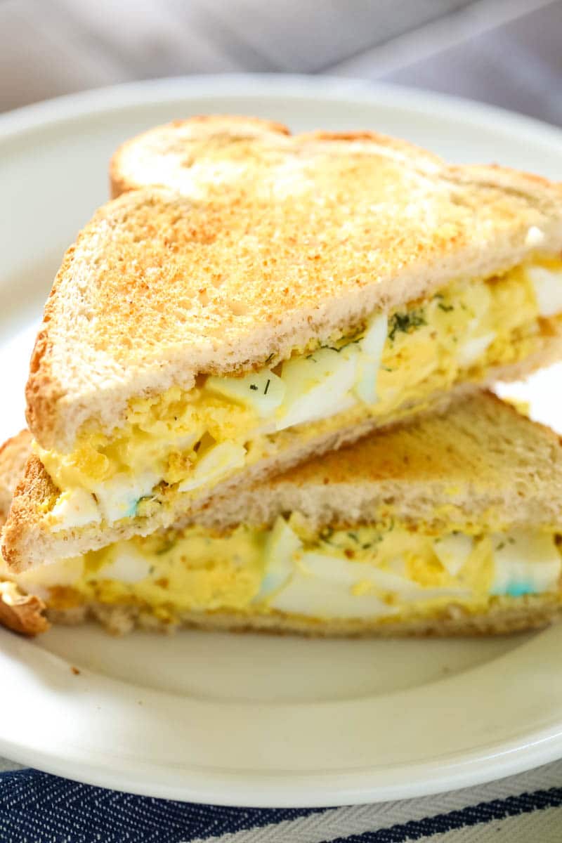 egg salad sandwich recipe cut into halves