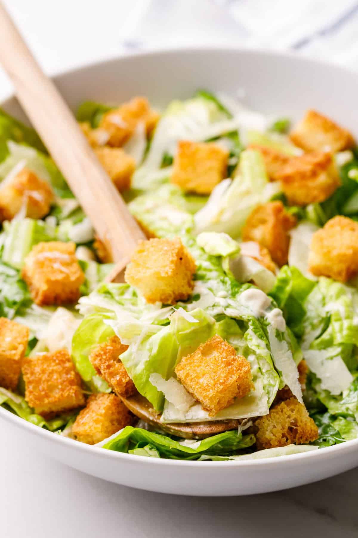 caesar salad with croutons shaved parmesan and homemade caesar dressing