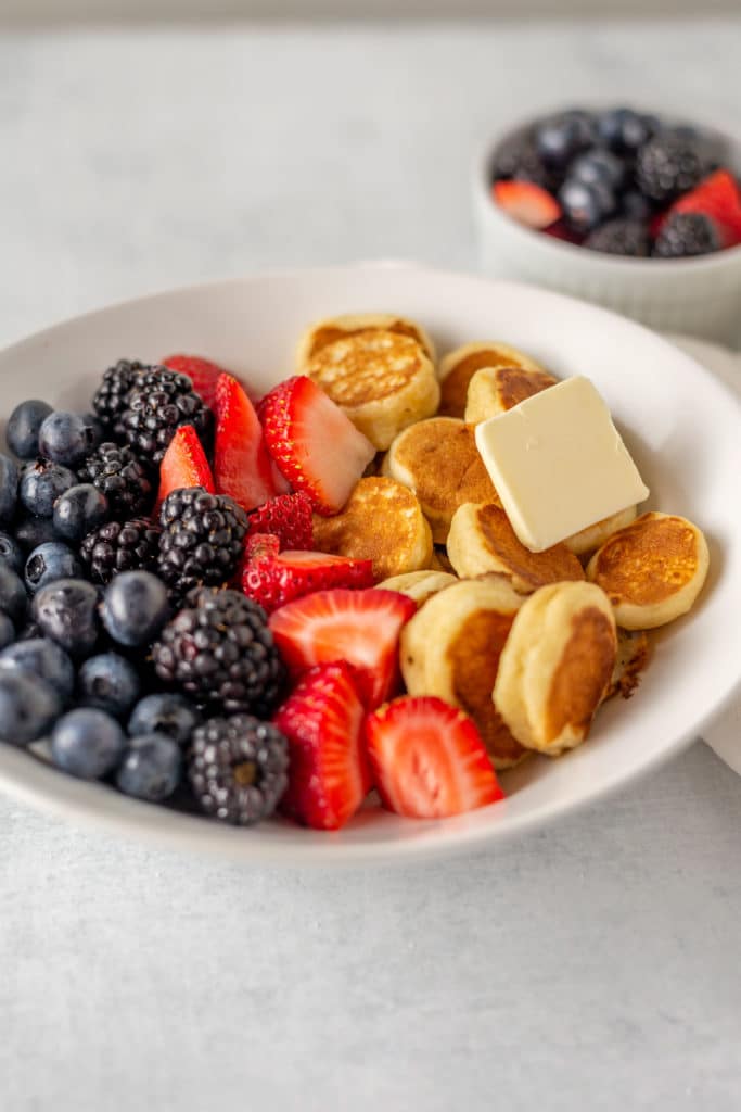 pancake cereal in a bowl with mixed berries 