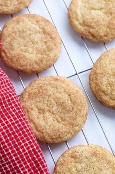 snickerdoodle cookies cooling on wire rack