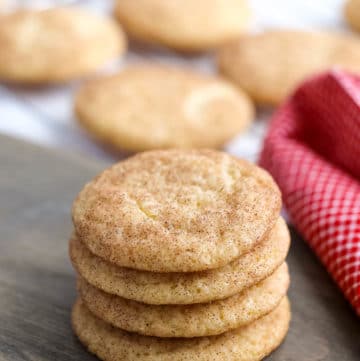 stacked snickerdoodle cookies on a table