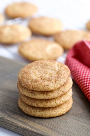 stacked snickerdoodle cookies on a table.