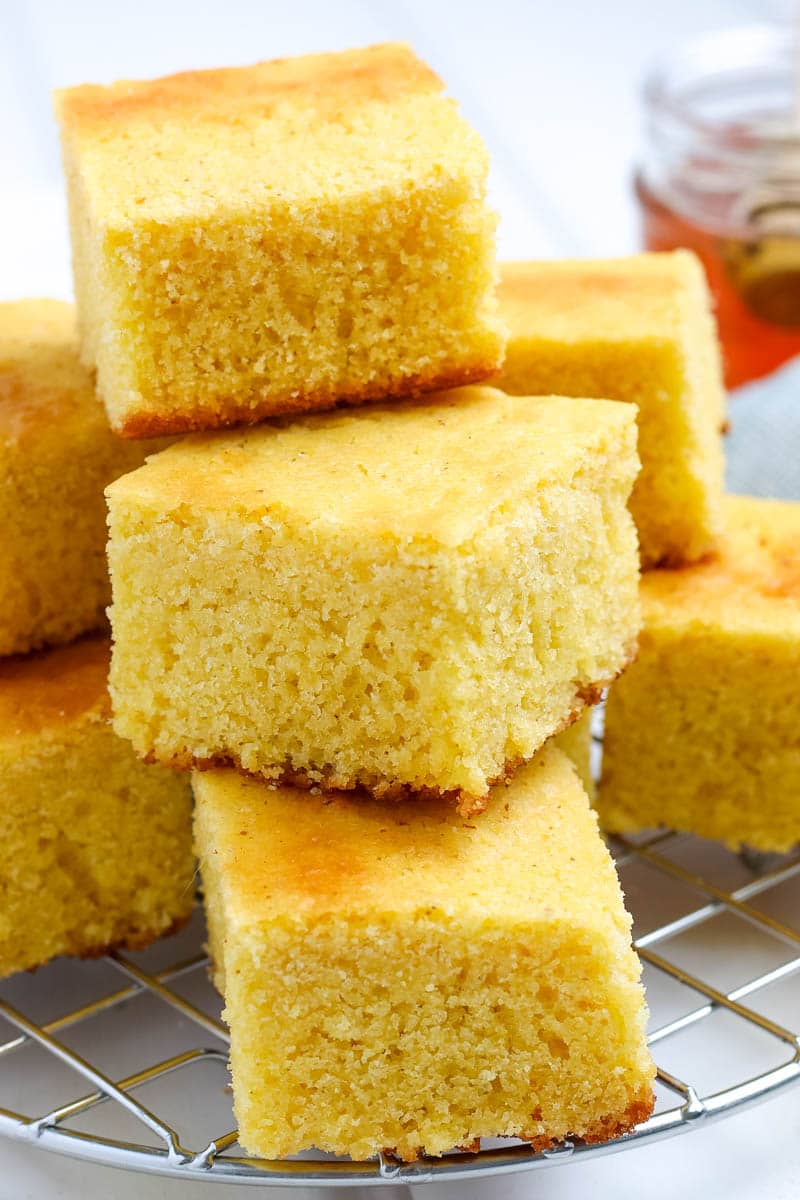 homemade cornbread  made and stacked on a rack