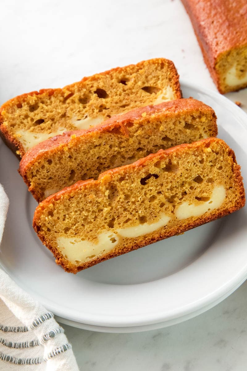 cream cheese pumpkin bread sliced and on plate 