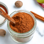 apple pie spice in a glass jar.