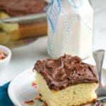 piece of baked cake with chocolate frosting