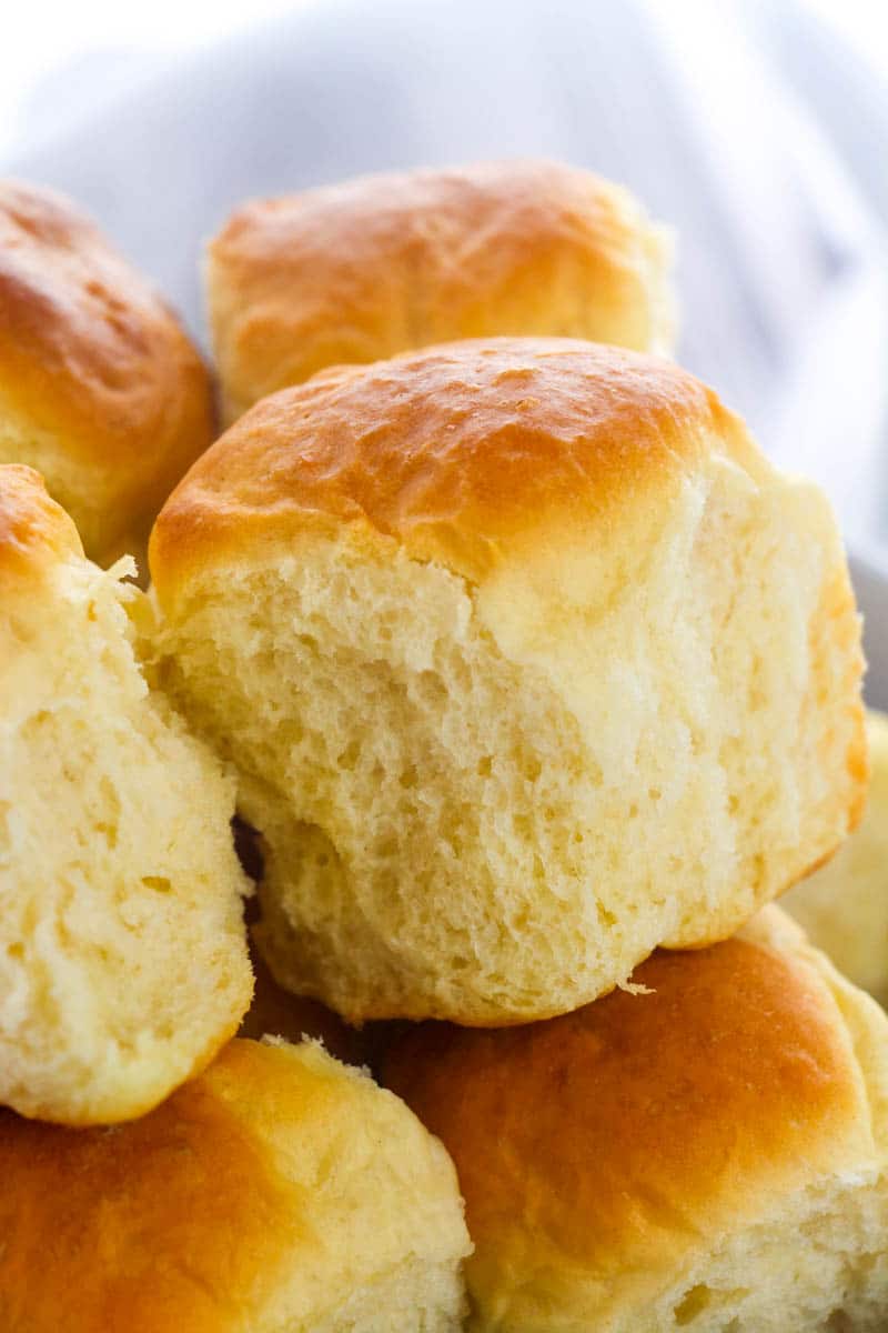 dinner rolls  stacked on a plate 