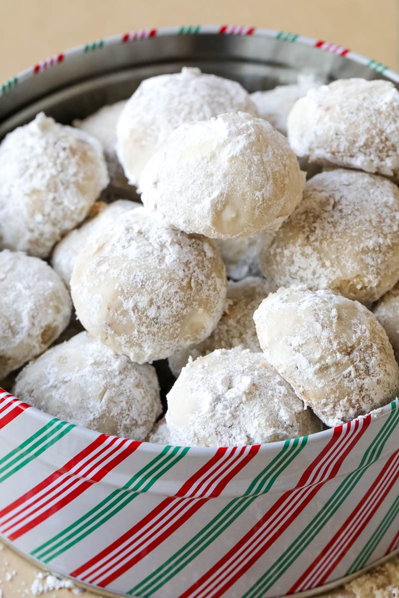 snowball-cookies in a holiday tin 