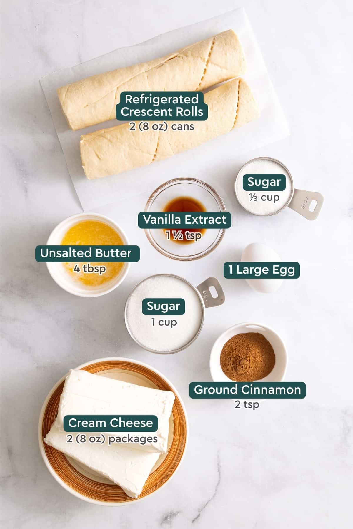 Ingredients for sopapilla cheesecake bars with labels.