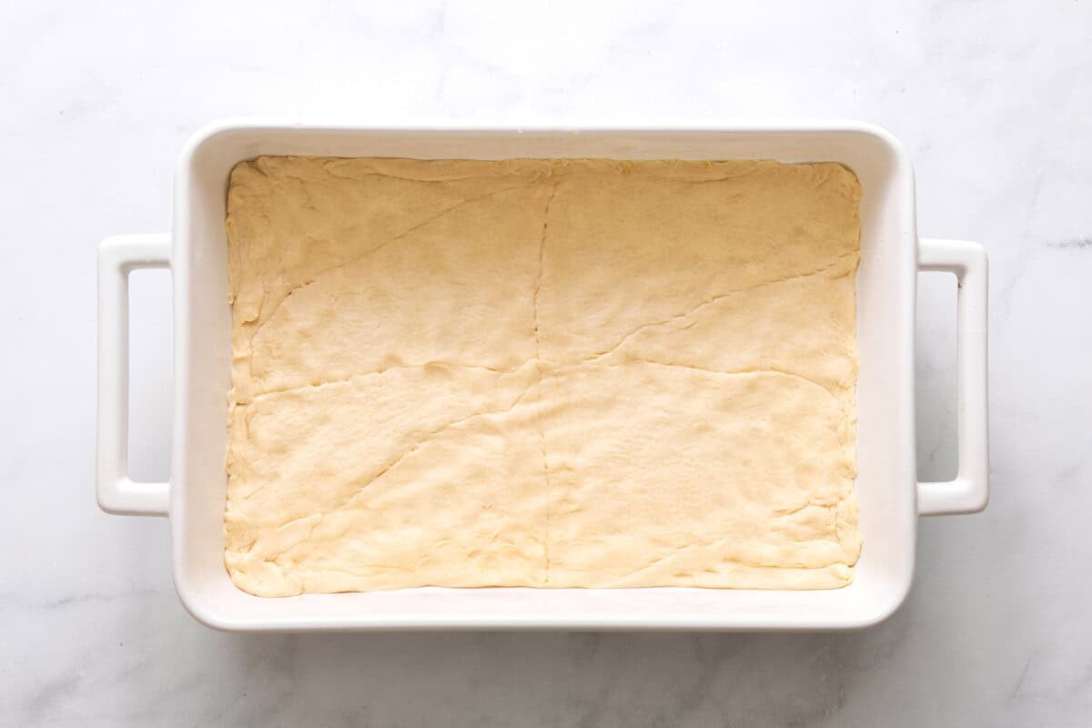 Crescent roll crust layered into bottom of baking dish.
