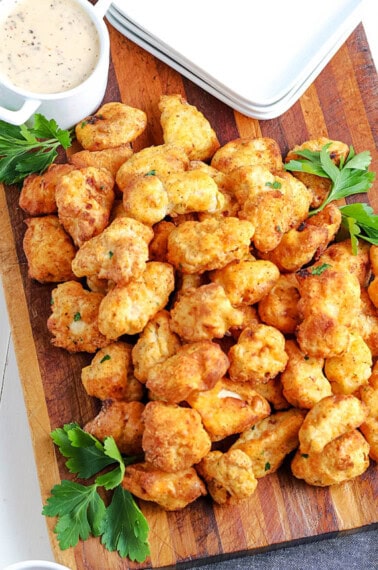 air fryer popcorn chicken on a cutting board