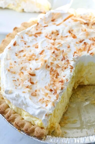 coconut pie topped with whipped cream
