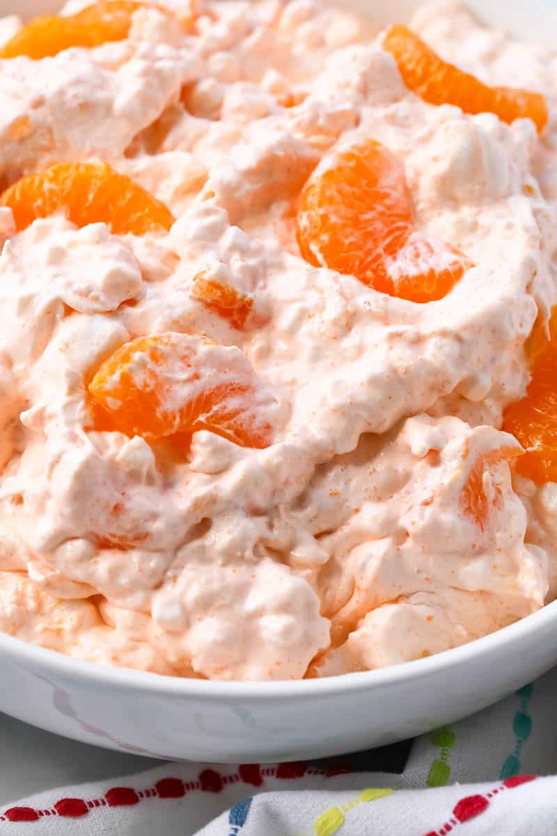 orange fluff in a white bowl