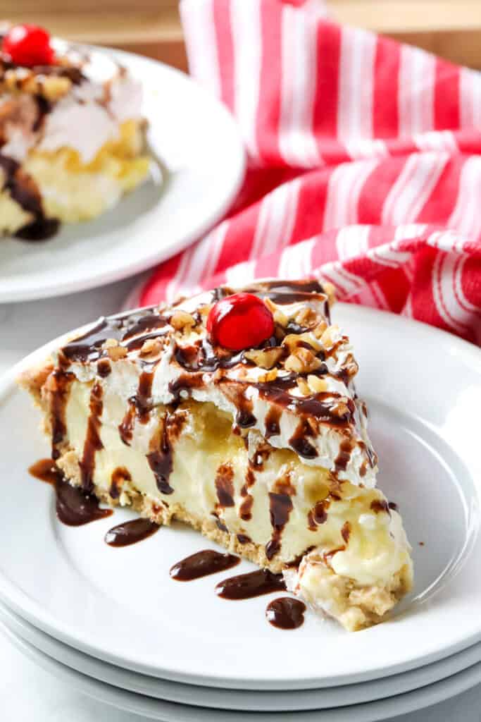 a slice a banana split pie on a plate